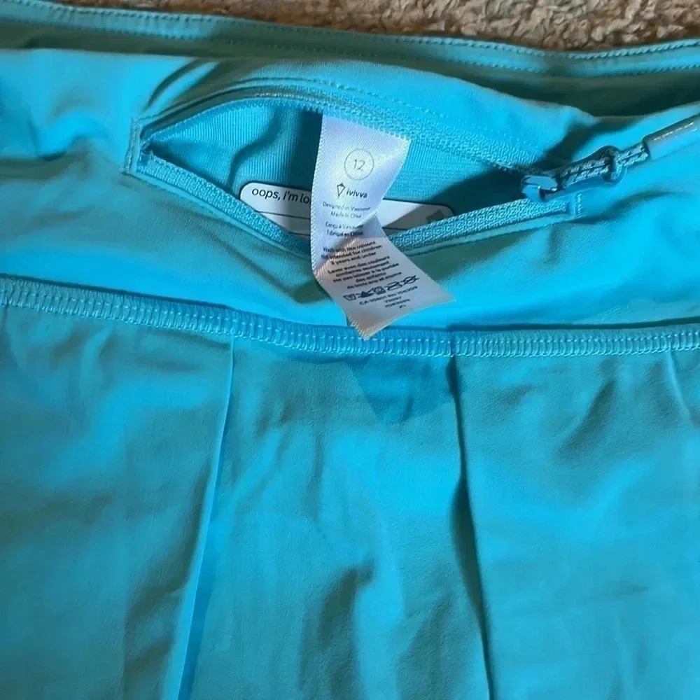 Ivivva girls lined pleated active/tennis skirt, skort size 12 - Picture 6 of 7